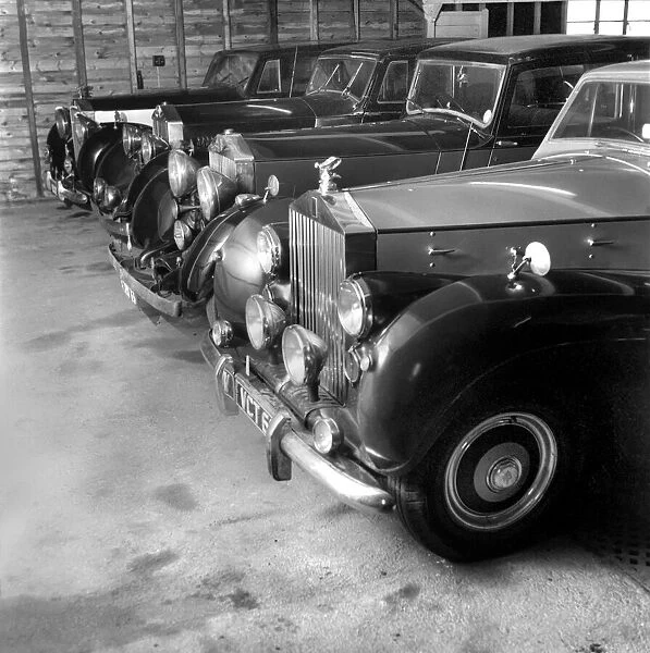 A collection of Veteran Rolls Royce cars stored in a Nissen hut. 1963