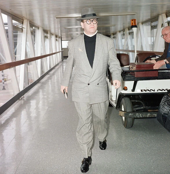 Elton John at London Airport. 29th July 1988