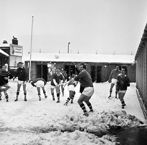Footballer players of non league Gravesend and Northfleet pictured having a snowball