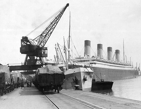 Freight being loaded onto Ocean Liner from train. c. 1950 English Railways