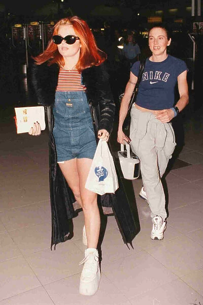 Geri and Mel C of the Spice girls leave Heathrow for Paris 1997