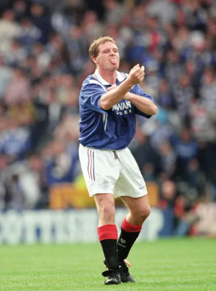 Glasgow Rangers footballer Paul Gascoigne making a one finger gesture while sticking out