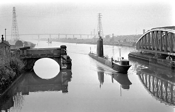 H. M.s Onyx leading H. M.s Olympus through the Barton Bridge area of the Manchester Ship
