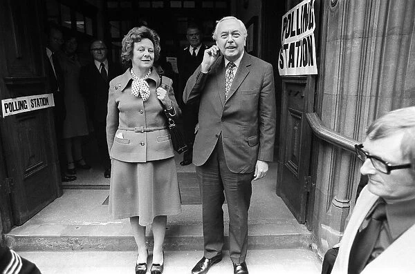 Harold Wilson and his wife Mary Wilson exit from a polling station after voting