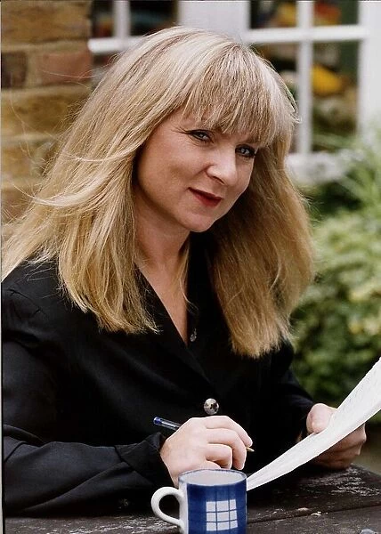 Helen Lederer comedian and actress at work on a script for her show