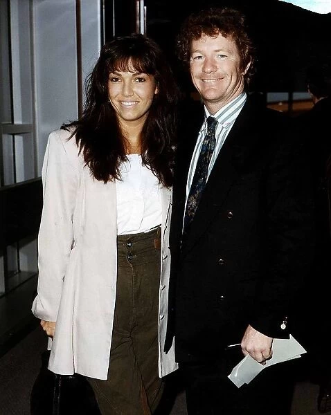 Jim Davidson TV Presenter and Comedian with wife Tracie Davidson at Heathrow Airport