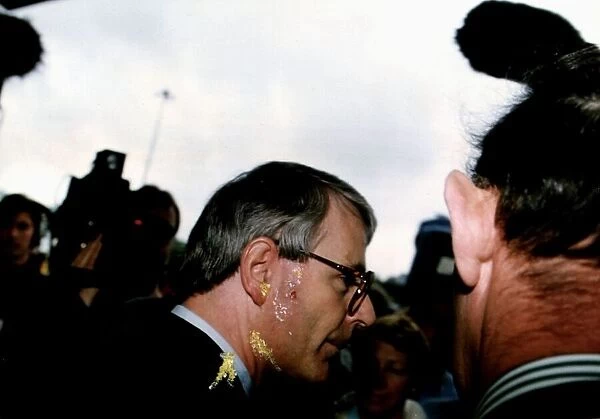 John Major Prime Minister has an egg thrown at his face at a sainsburys superstore in