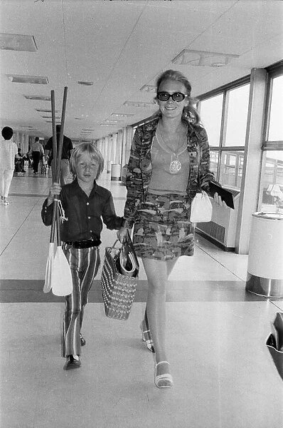 Juliet Mills and her son Sean at Heathrow Airport for New York