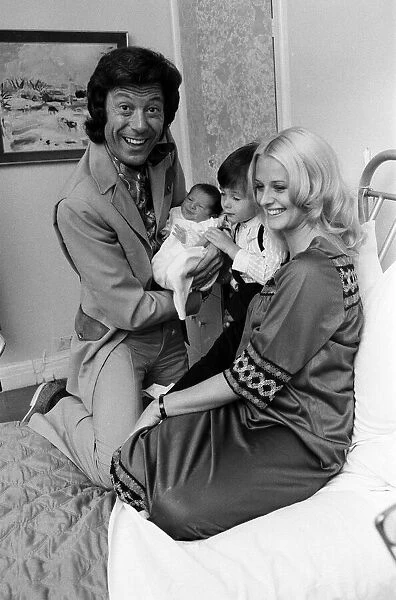 Lionel Blair with his wife Susan at the Avenue Clinic, Hampstead, with their children