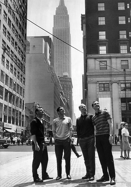 Liverpool Football players in New York, in front of the Empire State Building