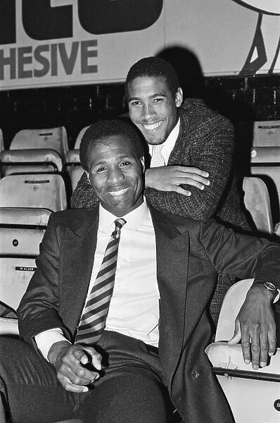 Luther Blissett, (left, in striped tie) and John Barnes (right