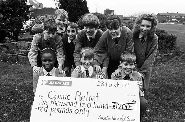 Masters of the roles... Salendine Nook High School pupils with a huge cheque for the huge