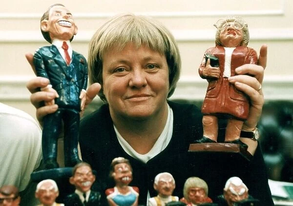 Mo Mowlam MP holding figurine of herself December 1997 and Prime Minister Tony Blair