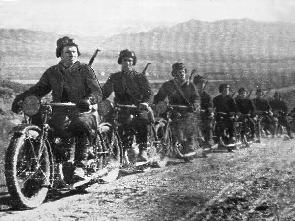 A motorcycle column of the Soviet Red Army on the march on the Southern Russia front as