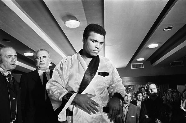 Muhammad Ali at a press conference prior to his fight with Alvin Lewis, aka Blue Lewis