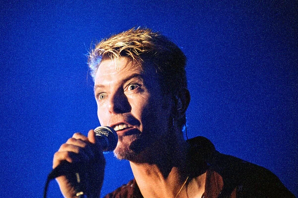 Pop star David Bowie performing on stage during a concert at The Barrowlands in Glasgow