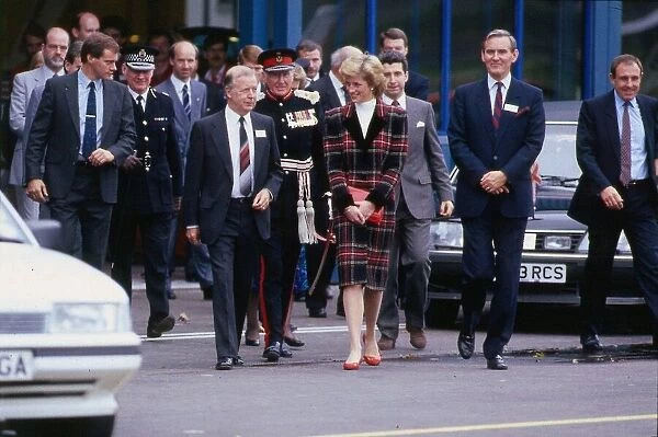 Princess Diana during a visit to Prestwick, Scotland. She is wearing a tartan suit