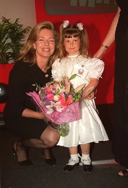 Queen Noor and Emily Casey heart op girl May 1999 at the Mirror Pride of Britain