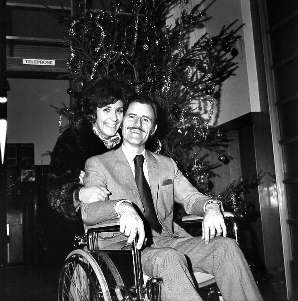 Racing driver Graham Hill left University College Hospital, in a wheelchair