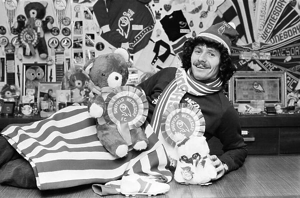 Sheffield Wednesday footballer Terry Curran decked out in the teams rosettes