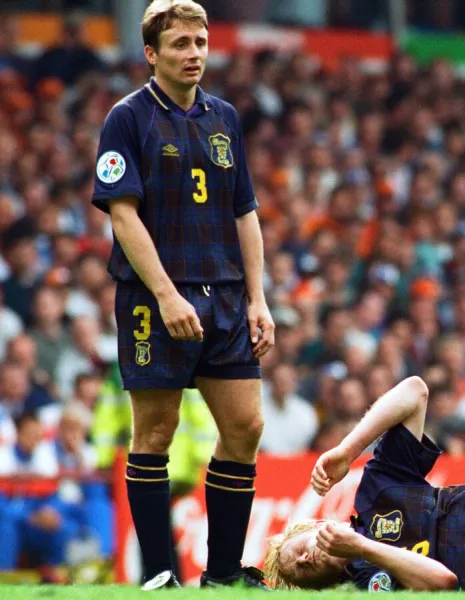 Tom Boyd of Scotland and Colin Hendry on the ground during the Scotland 0 v