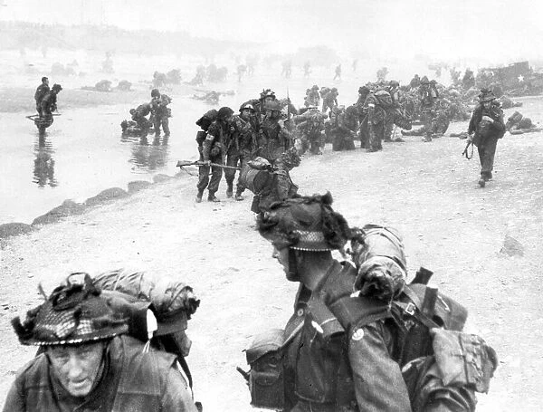 Troops of 3rd Infantry Division land on Queen Red beach, Sword area