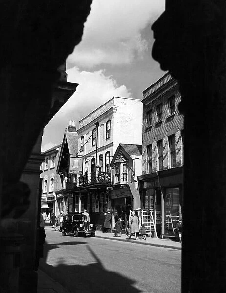 A view taken through an old archway off the main street in the old town of Hemel