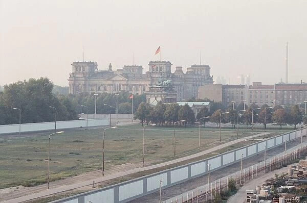 View of West Berlin across wall from East Berlin, showing The Brandenburg Gate & The
