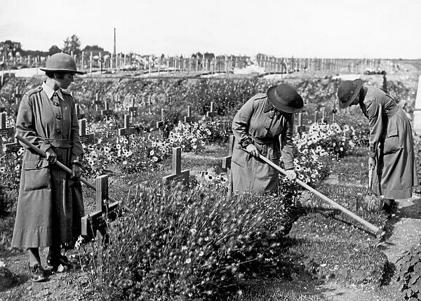 The Womens Army Auxiliary Corps gardeners seen here tending the graves of our fallen