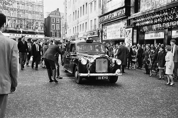 World heavyweight boxer Muhammad Ali arriving at the Odeon Cinema in Leicester Square