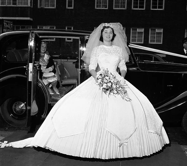 Yvonne Napier arrives for her wedding to Arnold Phelops in London