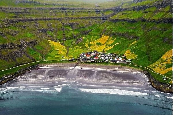 Aerial drone photo flying over Tjornuvik beach on Streymoy island, Faroe Islands, Denmark. Landscape photography