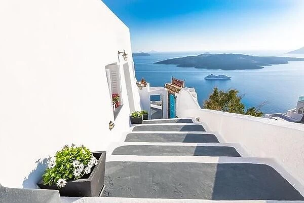 Amazing street view Santorini island. Greece traditional white and blue architecture, sea view and fantastic summer mood vibes. Luxury travel holiday