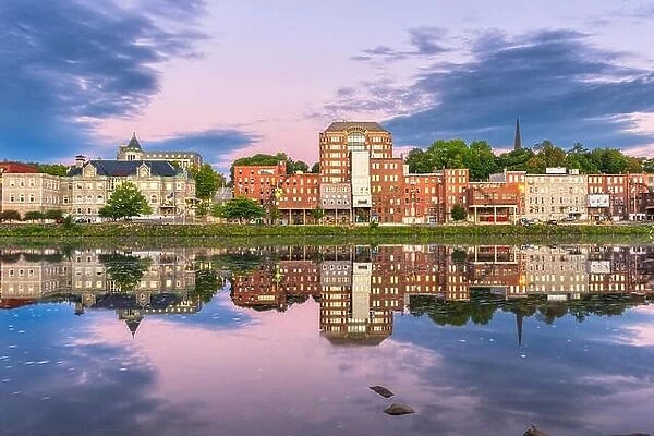 Augusta, Maine, USA town skyline on the Kennebec River at dusk