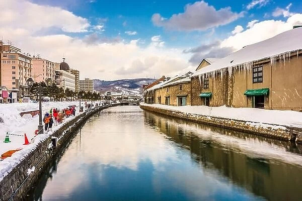 Otaru, Japan winter skyline on the canals