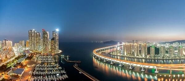 Panorama of Busan city skyline view at Haeundae district, Gwangalli Beach with yacht pier at Busan, South Korea