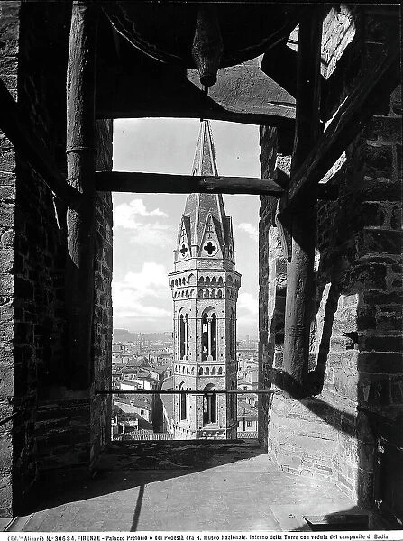 The bell tower of Badia Fiorentina seen from the tower of the Bargello in Florence, in Tuscany