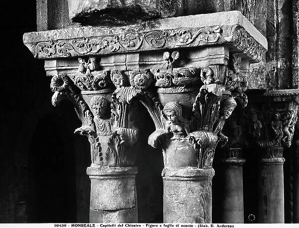 Two capitals with sculpted human figures and acanthus leaves in the cloister of the Cathedral of Monreale