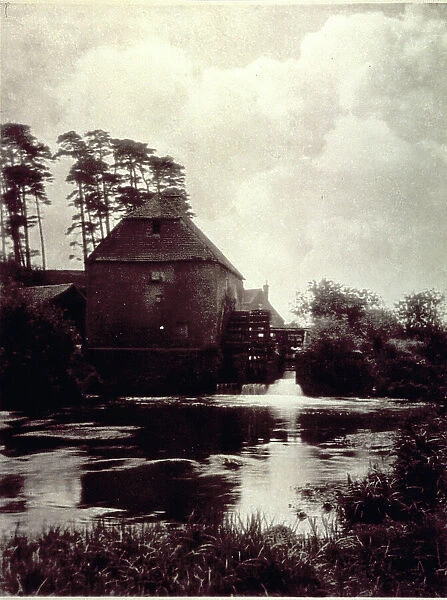 Characteristic water mills along the course of a river in a North European site