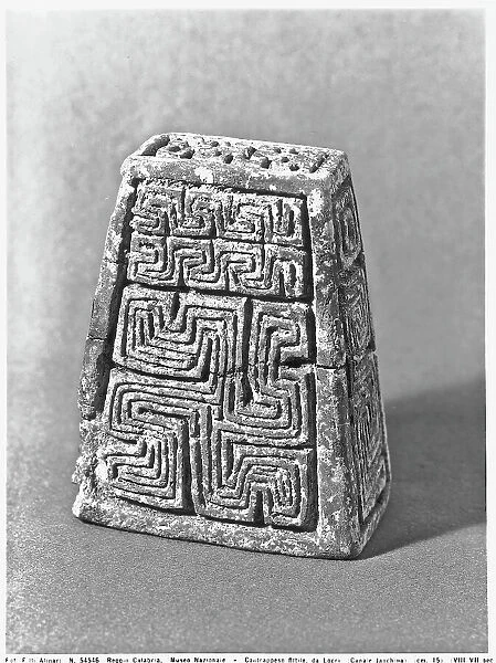 Fictile counterweight from Locri, work conserved at the National Museum in Reggio Calabria