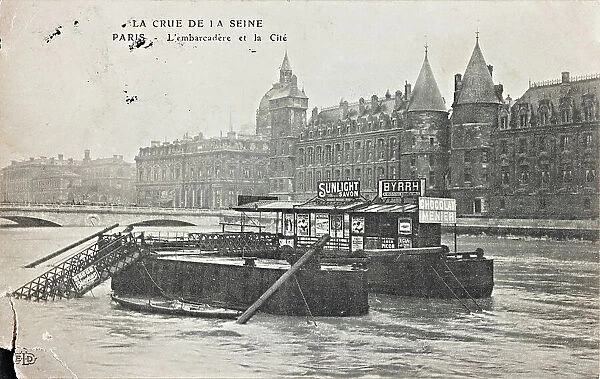 Flood of Paris, 1910: view of the pier and of the Seine riverside; postcard