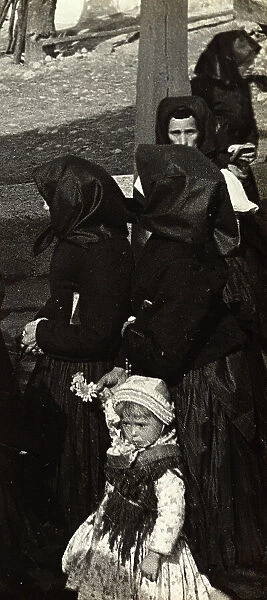 Hungarian women with a little girl in traditional dress
