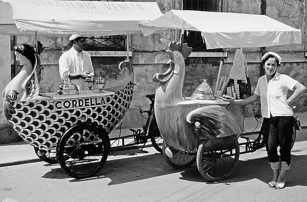 Portrait of ice cream sellers with fun kiosks on the streets of Ravenna