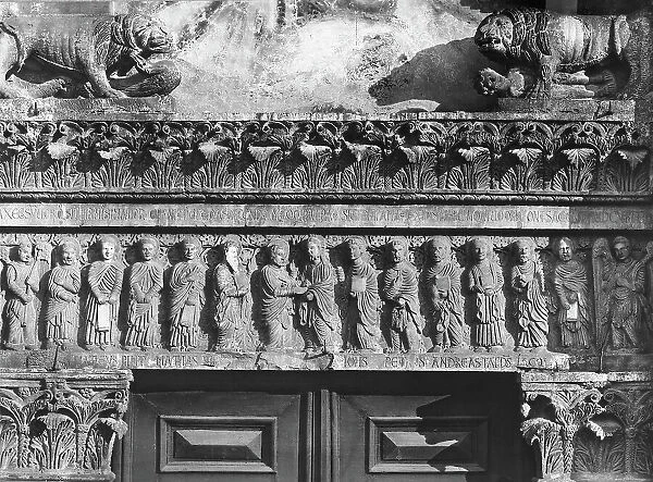 The redeemer gives the commandments to the apostles. Bas-relief from the architrave of the portal of the church of St Bartolomeo in Pantano in Pistoia