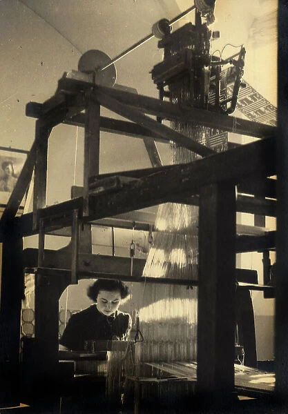 Young woman working at a loom in a workshop. Postcard sent by the author to Vincenzo Balocchi