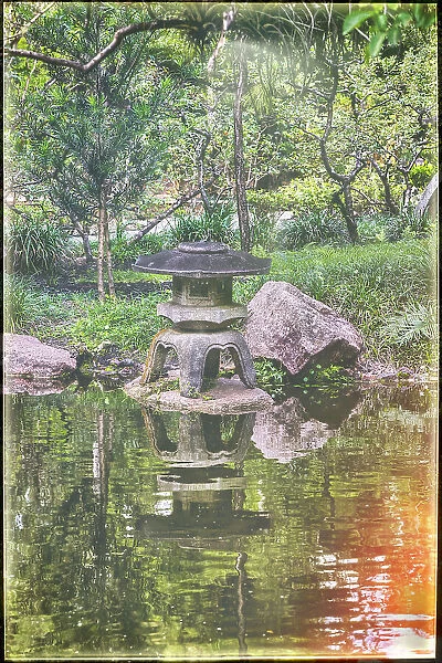 Florida, Delray Beach, Morikami Museum and Japanese Gardens, Japanese pagoda lantern reflecting in water