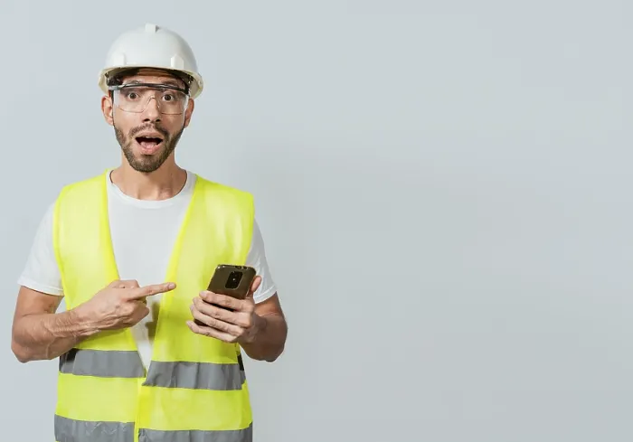 Framed Print : Construction Engineer Pointing at Phone Print
