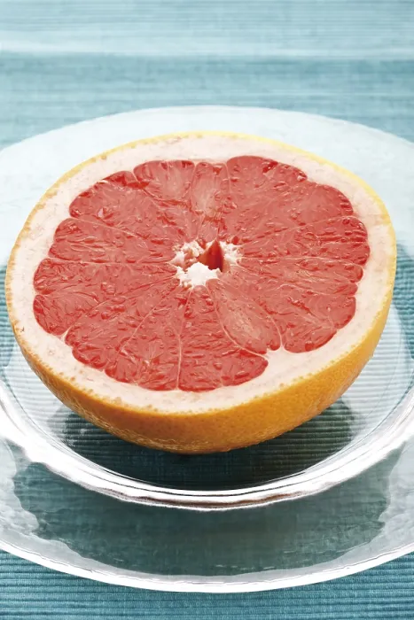 Framed Print : Half of a Red Grapefruit Print on Glass Plate Framed Print : Half of a Red Grapefruit Print on Glass Plate