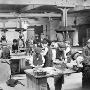 Children labelling tins of tea c. 1910, Butlers Wharf BB87_09690