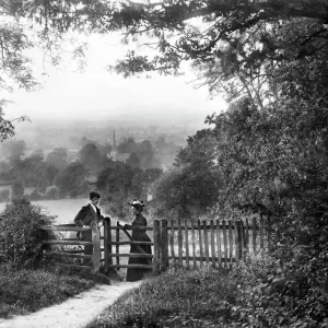 Print of a couple by a country gate in Mickleton, Gloucestershire